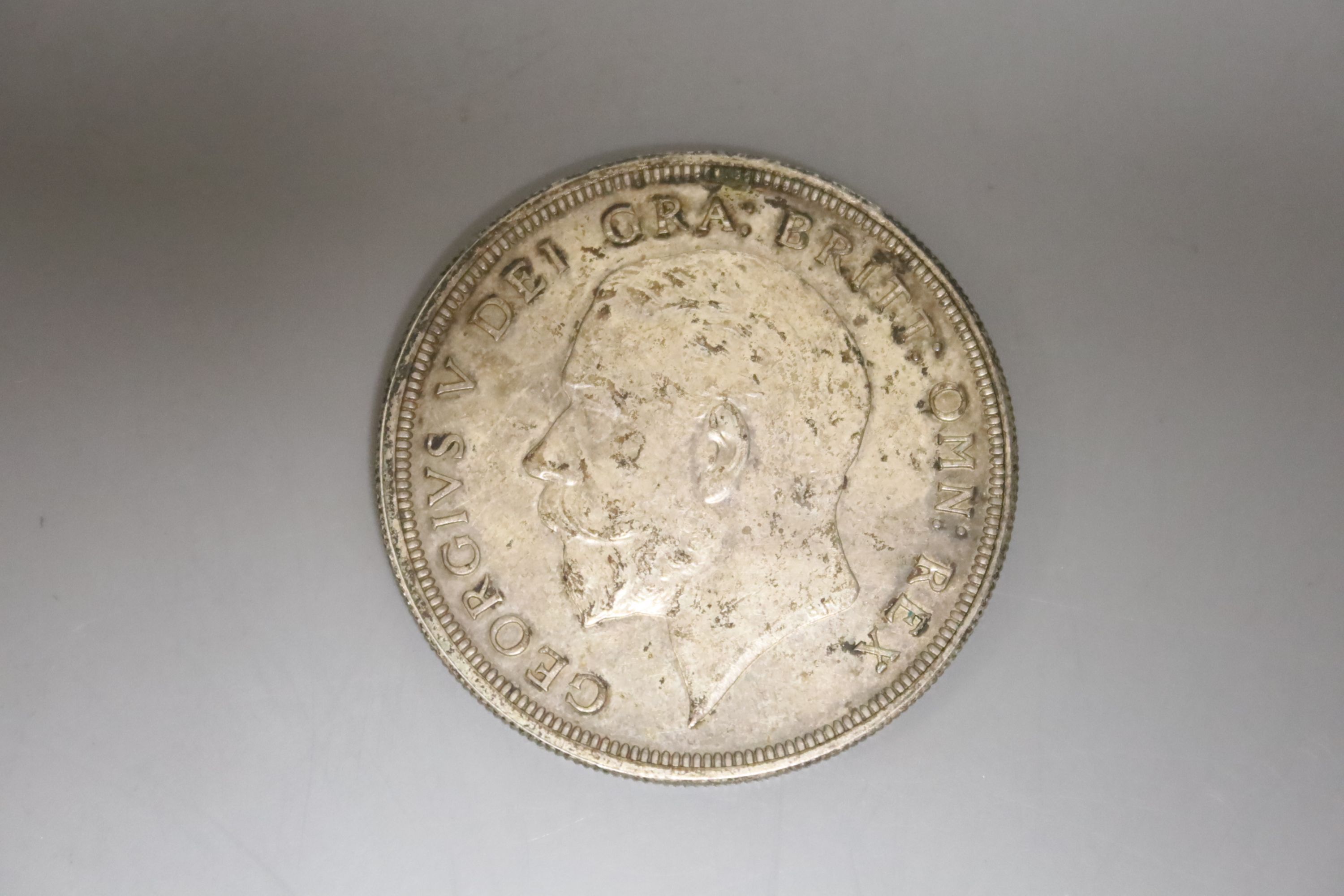 A George V silver crown, 1927, surface spotting, otherwise good EF